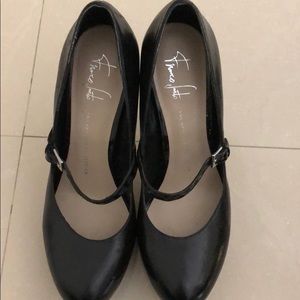 Black leather Mary Janes